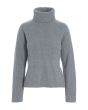Gamine knit turtleneck blouse