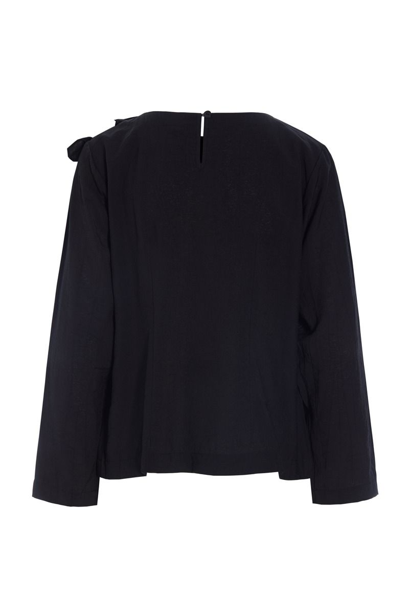 Karu bluse med flæse