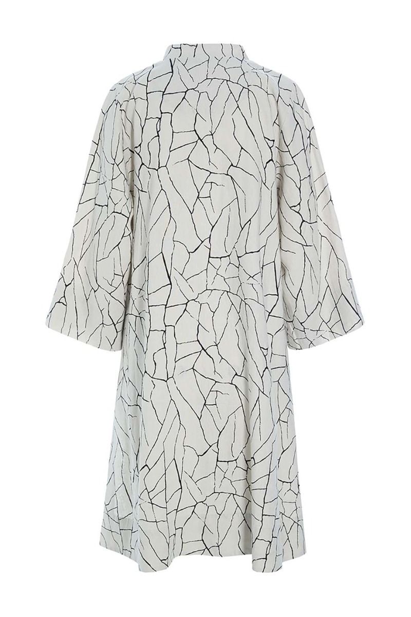 Craquelure coat dress